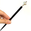 The large size of the Penelope Tidal Hair Stick made from iridescent clear glass beads.