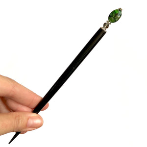 The large size of the Quinn Tidal Hair Stick made from green Jasper stone beads.
