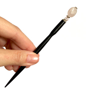 A full shot of our Riley Hair Stick made from rose quartz stone.