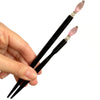 The standard and large sizes of the Roxy Tidal Hair Stick made of pink cat's eye glass.