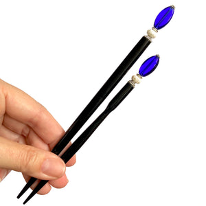 The standard and large sizes of the Stella Tidal Hair Stick made from cobalt blue glass beads.