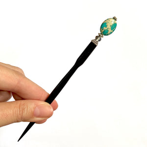 A full view of the Terra Tidal Hair Stick made from blue Jasper stone beads.