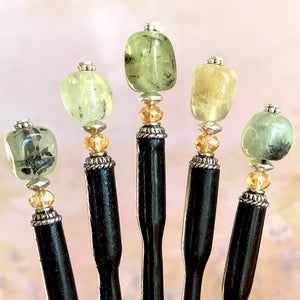 Five of our Vera Tidal Hair Sticks made of green Prehnite Stone beads.