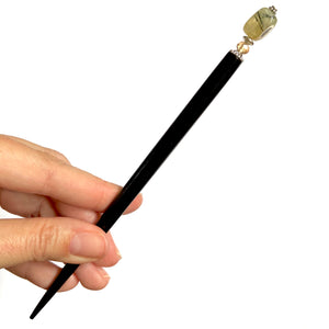 The large size of the Vera Tidal Hair Stick made of yellow green Prehnite Stone beads.