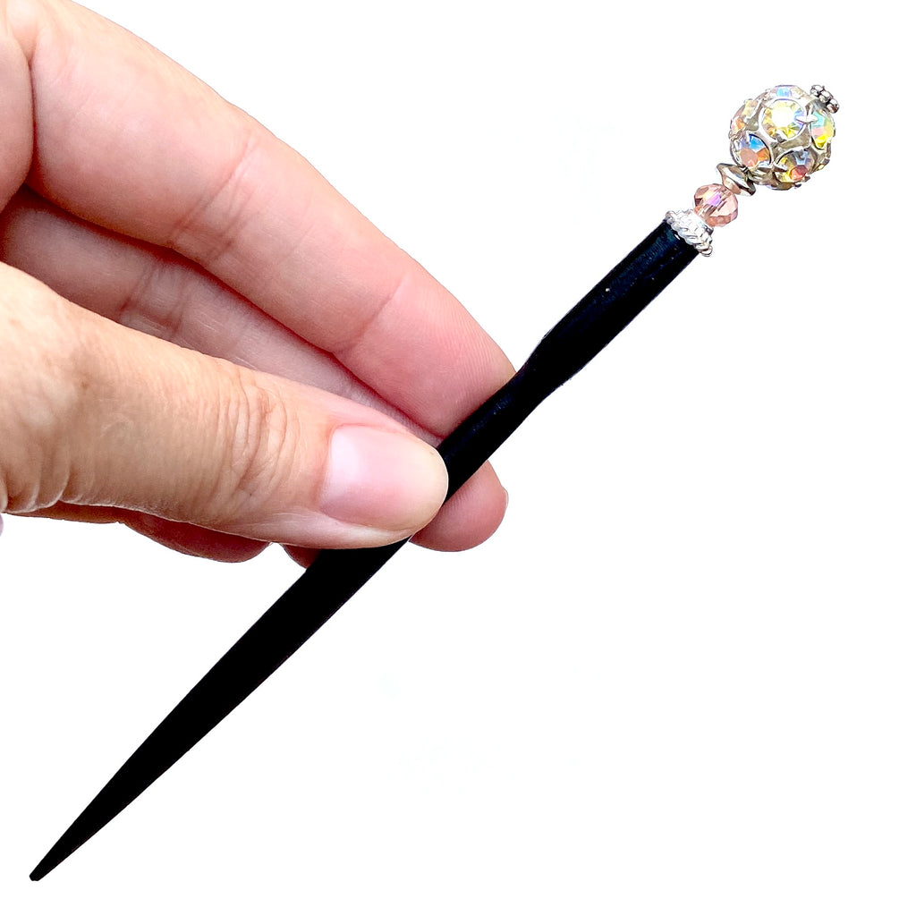 A full shot of our Lindsey Hair Stick made from silver Czech glass beads