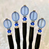 Five of our Sydney Hair Sticks made from sapphire blue Czech glass beads.