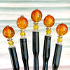 Five of our Maya Hair Sticks made with orange-yellow crackle Czech glass beads.