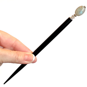 The large size A close up of the Malia Tidal Hair Stick made from gray Labradorite stone beads.