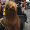 A woman in NYC wears a Charlotte Tidal Hair Stick